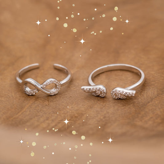 Engelsrufer Ringe für Damen: Silber mit Infinity-Symbol und Zirkoniasteinen sowie offener Ring mit Flügeln aus Zirkonia